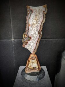 Brazilian Agate slab sculpture mounted on Jasper by Dusty Atkinson of Stone Art Studios.